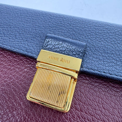 Miu Miu Pebbled Leather Foldover Expandable Colorblock Wallet Navy Blue Maroon