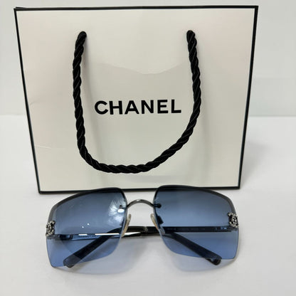 CHANEL Blue Tinted Rhinestone Logo Rimless Sunglasses