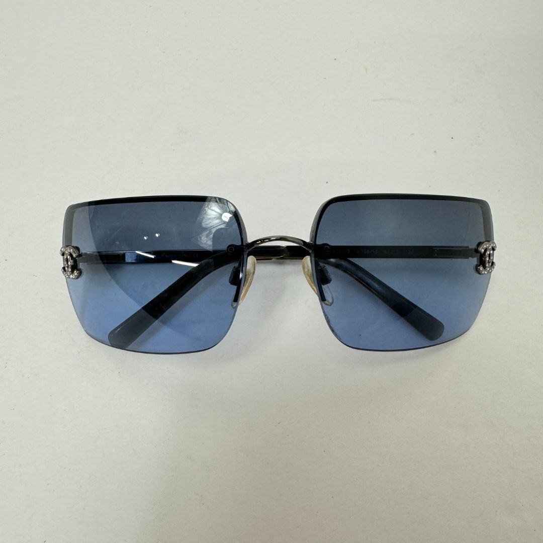 CHANEL Blue Tinted Rhinestone Logo Rimless Sunglasses